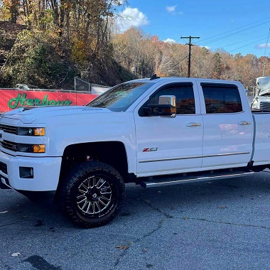 Chevy Z71 white truck outside of Harbour Garage auto service center in Collinsville, VA